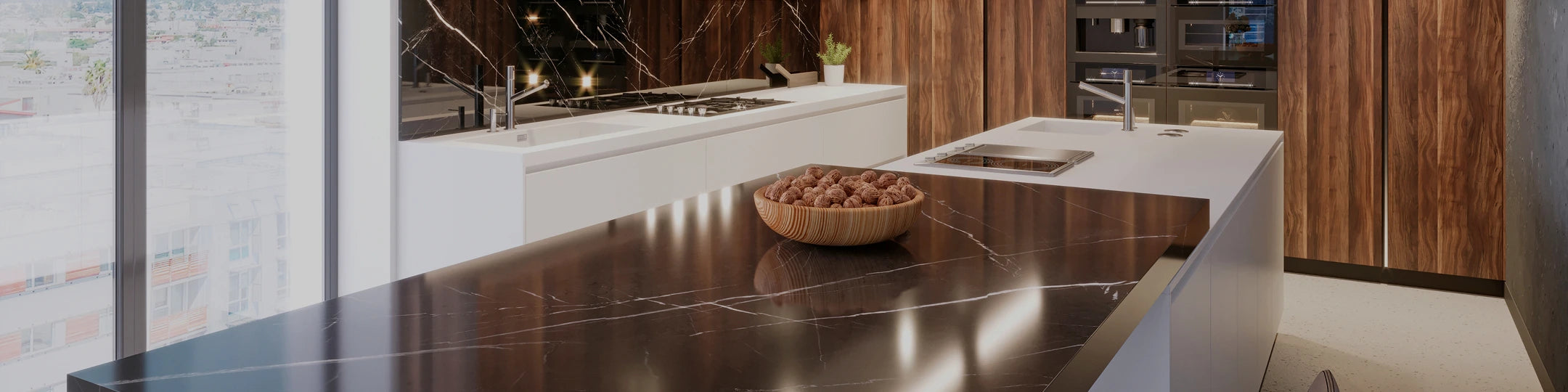 Modern kitchen with a island and bowl of fruit